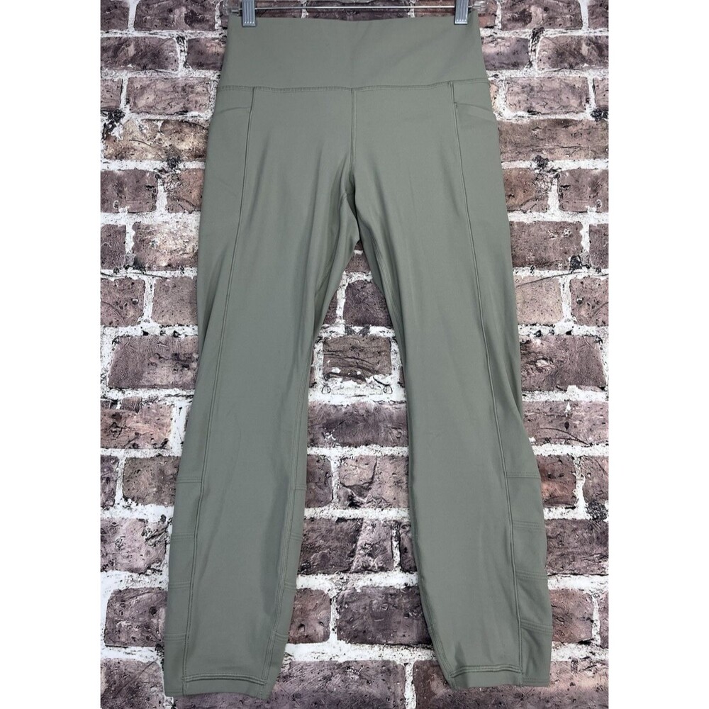 Athleta Salutation Stash Pocket II Cinch Leggings M Yoga Gym Powervita 7/8 Soft